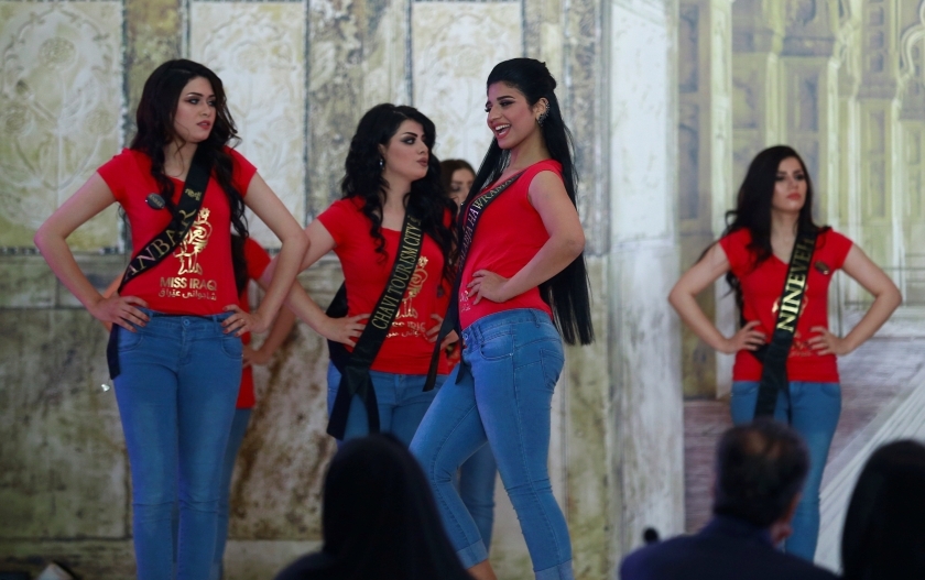 Participants wait for judges to determine the winner of Miss Iraq during the final round of judging in Baghdad, Iraq, May 25, 2017. (Photo: Reuters)